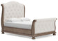 Ardenfield Queen Upholstered Sleigh Bed with Mirrored Dresser